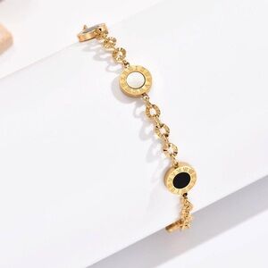 Elegant Gold and Black Bracelet
